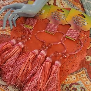 Pink bead tiebacks